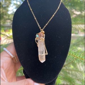 Gold colored chain with genuine crystal quartz